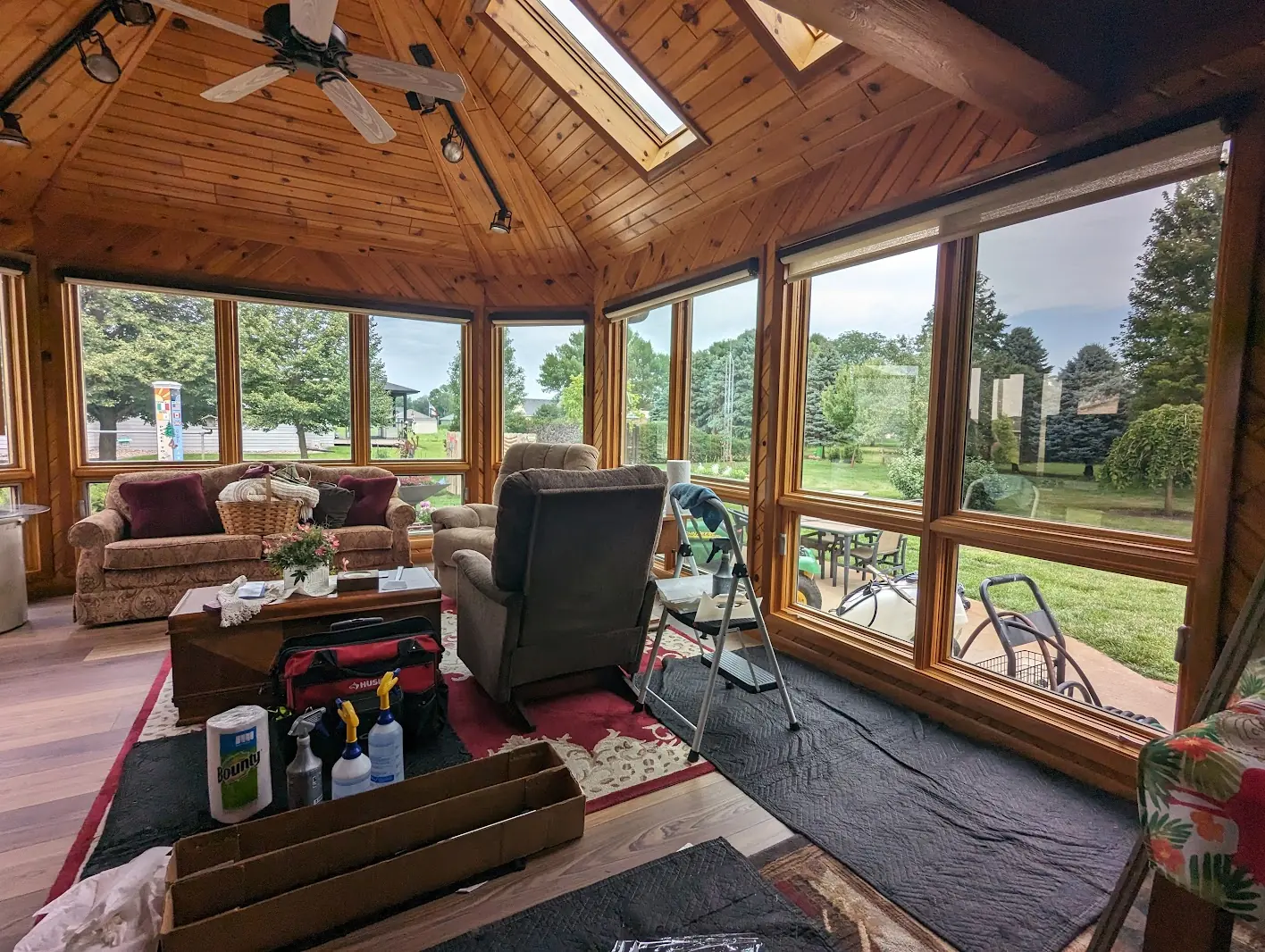Sunroom with wraparound windows after solar window film install in a Sioux City home